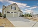 Charming single-Gathering home with a two-car garage, well-manicured lawn, and inviting curb appeal at 339 Cottonwood Cir, Peachtree City, GA 30269