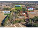 An aerial shot highlighting the property's location and surrounding acreage at 1045 E Lake Road, Mcdonough, GA 30252