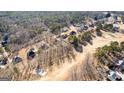 Beautiful aerial of neighborhood with golf course and homes at 1585 Lake Dow Rd, Mcdonough, GA 30252