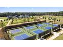 Overhead view of new community pickleball courts and walking paths in a beautiful Oak Ridge Meadows neighborhood at 588 Parnassus Road, Locust Grove, GA 30248