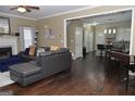 Spacious living room with a fireplace, hardwood floors, and an open layout at 1103 Coleman Sw St, Atlanta, GA 30310