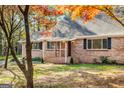 Inviting brick home with lush trees at 425 Meadowbrook Dr, Mcdonough, GA 30253