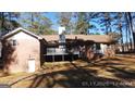 Backyard with a deck, perfect for outdoor entertaining or relaxation at 863 New Hope Dr, Hampton, GA 30228