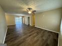Spacious living area with hardwood floors and access to the patio at 2205 Chestnut Hill Cir, Decatur, GA 30032