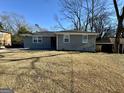 Modest single-story home with a simple exterior and lawn at 2690 Rollingwood Se Ln, Atlanta, GA 30316