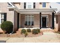 Inviting front porch with seating area, perfect for enjoying the outdoors at 2920 Stanway Ave, Douglasville, GA 30135