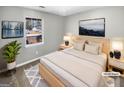 Inviting main bedroom with a comfortable bed, soft lighting, and a picturesque view of the outdoors at 12 Bonnie Glen Ln, Hampton, GA 30228