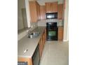 Well-equipped kitchen with ample countertop space, stainless steel sink, and modern appliances at 358 Southgate Dr, Locust Grove, GA 30248
