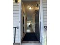 Inviting entryway with hardwood floors leads into a bright and spacious home at 5509 Park Place South, Atlanta, GA 30349