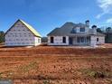 View of the home under construction, highlighting its layout and potential outdoor space at 454 Snead Road # 3, Fayetteville, GA 30215