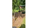 Yard featuring an enclosed growing area with a wire fence at 2317 Hillside Rd, Riverdale, GA 30296