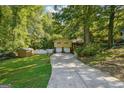 Split level home with two car garage on a large lot at 6226 Lullwater Dr, Douglasville, GA 30135