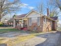 Charming brick home with a cozy front porch and traditional architectural details at 732 Cascade Sw Ave, Atlanta, GA 30310