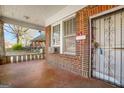 Cozy front porch with brick exterior and vintage charm at 732 Cascade Sw Ave, Atlanta, GA 30310