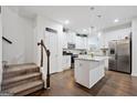 Stylish white kitchen with stainless steel appliances and a center island at 2271 Rolling Trl, Lithonia, GA 30058