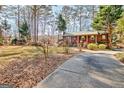 Well-kept front yard featuring a charming home with gazebo at 562 Adams Rd, Fayetteville, GA 30214