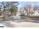 Street view of a charming home with an inviting front porch at 916 Marshall Fuller Rd, Dallas, GA 30157