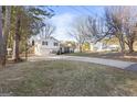 Two-story home with a front porch and a basketball hoop next to the driveway at 916 Marshall Fuller Rd, Dallas, GA 30157