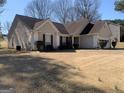 Charming single-story home with a well-manicured lawn and neutral-colored siding at 4019 Pin Oak Trl, Decatur, GA 30034