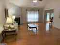 Bright living room features hardwood floors, fireplace, and natural light at 4019 Pin Oak Trl, Decatur, GA 30034