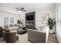Inviting living room features a modern fireplace, ample seating, and stylish decor for comfortable living at 1320 Kay Se Ter, Conyers, GA 30013