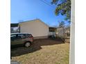 View of backyard with a shed and a car, showing outdoor space at 4748 Ash St, Doraville, GA 30340