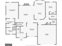 This floor plan showcases the layout of the primary bedroom, living room, kitchen, dining room, and garage at 190 Bridgemill Dr, Hampton, GA 30228