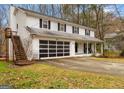 Charming two-story home featuring a welcoming front porch and a convenient two-car garage at 1917 Lake Ridge Ct, Jonesboro, GA 30236