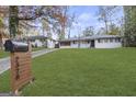 Inviting home exterior with lush lawn, mailbox, and visible house number at 2378 Green Forrest Dr, Decatur, GA 30032