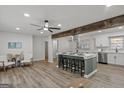 Open-concept kitchen with a large island, seating, and modern appliances at 2378 Green Forrest Dr, Decatur, GA 30032