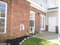 Brick backyard with a well-maintained lawn at 11 Reese Way, Avondale Estates, GA 30002