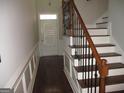 Entrance foyer with hardwood floors and staircase at 11 Reese Way, Avondale Estates, GA 30002