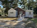 A charming home with a ramp for easy access to the rear entrance at 718 N. Hairston Rd, Stone Mountain, GA 30083