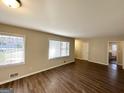 Bright and airy living room with wood floors, neutral paint, and natural light at 3558 Turner Heights Dr, Decatur, GA 30032
