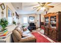 Relaxing living room with hardwood floors, classic decor, and backyard access at 9100 Settlers Grove Ne Rd, Covington, GA 30014