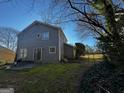This home features a spacious backyard with a fence, offering privacy and a great space for outdoor activities and relaxation at 120 Wayside Dr, Lawrenceville, GA 30046