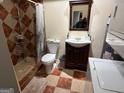Bathroom with a shower, toilet, sink, vanity, and laundry machines at 4100 Scott S Dr # 0, Forest Park, GA 30297