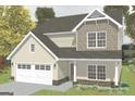 Charming two-story home with a symmetrical design, attached garage, and light colored siding at 11160 Cornerstone Way, Hampton, GA 30228