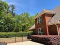 Brick home with fenced backyard at 1209 Persimmon Way, Mcdonough, GA 30252