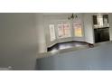 Dining area featuring hardwood floors, chandelier and view to kitchen at 3789 Conley Downs Ln, Decatur, GA 30034