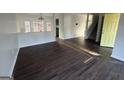 Open concept living room with hardwood floors, natural light and stairs at 3789 Conley Downs Ln, Decatur, GA 30034