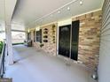 Inviting front porch with brick accents and a cozy seating area near the front door at 2691 Old South Dr, Jonesboro, GA 30236