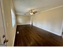Bright living room featuring hardwood floors, ceiling fan, and natural light at 2194 Loring Ct, Decatur, GA 30032