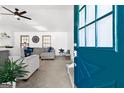 Inviting living room with neutral tones, comfortable seating, and ample natural light at 104 Sage Blue, Peachtree City, GA 30269