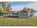 Expansive backyard featuring a spacious deck and mature trees at 2431 Weatherford Ct, Marietta, GA 30068