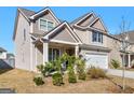 Beautiful two-story home with covered entry and attached two car garage at 2361 Hanover Woods Rd, Lithonia, GA 30058