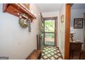 Welcoming entryway featuring decorative tile floor and charming entryway decor at 1972 Cox Dr, Austell, GA 30168