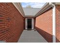 A welcoming red-brick entryway leads to the front door at 628 Morningside Dr, Stockbridge, GA 30281