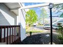 View from covered porch featuring stone walkway and lush landscape at 277 Clearview Ct, Villa Rica, GA 30180