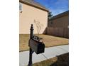 Neatly kept front yard with green grass, sidewalk, and mailbox displaying the house number at 2478 Oakleaf Rdg, Lithonia, GA 30058